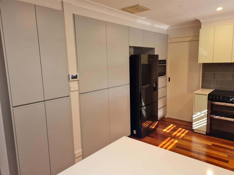 A renovated kitchen with timber floors